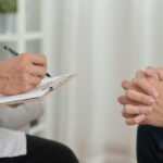 Patient discussing symptoms during psychiatric evaluation process