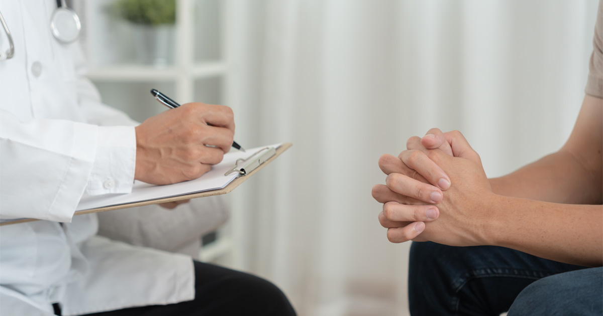 Patient discussing symptoms during psychiatric evaluation process